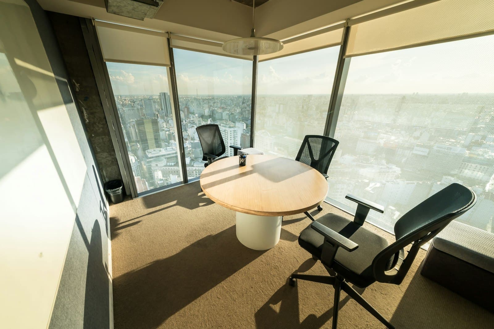 A modern meeting room with a view over the city